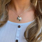 Silver Woman of Valor Ruby Pendant